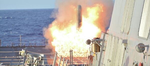 A file photo showing a Tomahawk Land Attack Missile launches from Arleigh Burke-Class guided-missile destroyer USS Lassern (DDG 82) during Multi-Sail 2015 A file photo showing a Tomahawk Land Attack Missile launches from Arleigh Burke-Class guided-missile destroyer USS Lassern (DDG 82) during Multi-Sail 2015 - Sputnik International