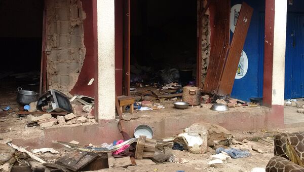 Debris lays strewn over the area after a bomb exploded at a mosque in Jos, Nigeria - Sputnik International