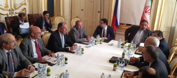 Russian and Iranian foreign ministers Sergei Lavrov and Mohammad Javad Zarif meeting in Palais Coburg Russian and Iranian foreign ministers Sergei Lavrov and Mohammad Javad Zarif meeting in Palais Coburg - Sputnik International