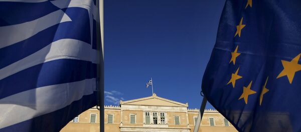EU flag and a Greek flag EU flag and a Greek flag - Sputnik International