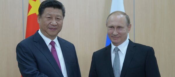 President of the Russian Federation Vladimir Putin (right) and President of the People’s Republic of China Xi Jinping during their meeting in Ufa. President of the Russian Federation Vladimir Putin (right) and President of the People’s Republic of China Xi Jinping during their meeting in Ufa. - Sputnik International