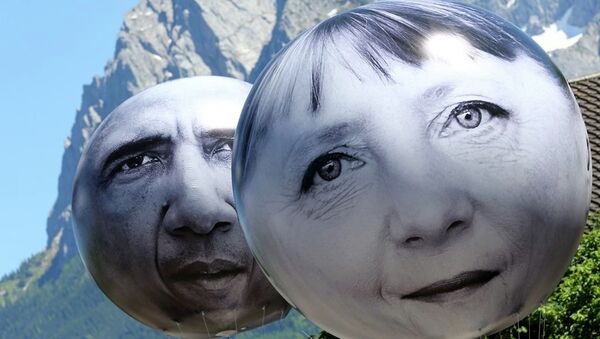 Balloons with the faces of German Chancellor Angela Merkel, left, and U.S. President Barack Obama - Sputnik International