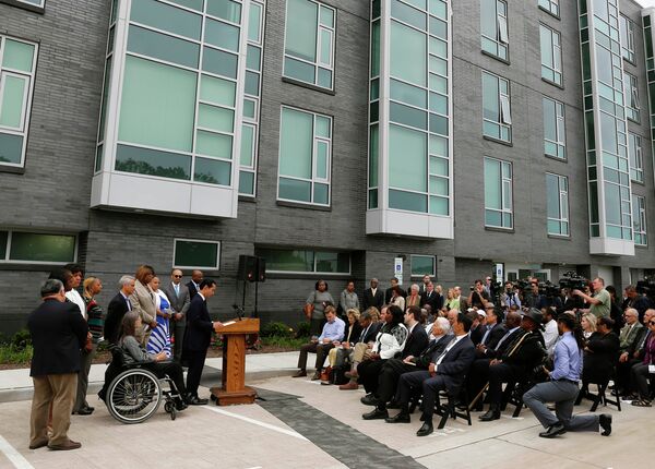 Housing and Urban Development Secretary Julian Castro announces a policy change at a news conference Wednesday, July 8, 2015, in Chicago next to new public housing units on the city's South Side Housing and Urban Development Secretary Julian Castro announces a policy change at a news conference Wednesday, July 8, 2015, in Chicago next to new public housing units on the city's South Side - Sputnik International