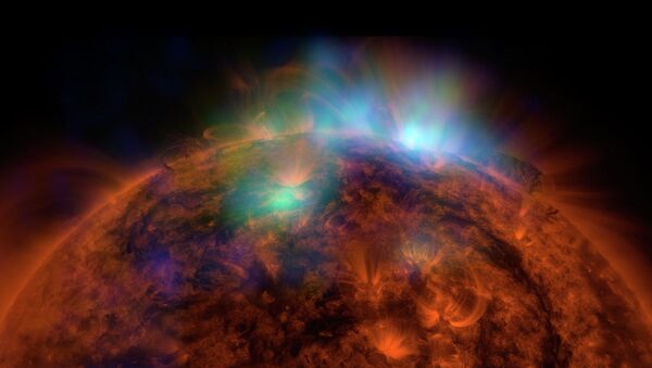 The first high-energy X-ray picture taken by NuSTAR, showing the Sun's west limb, was released in December. - Sputnik International