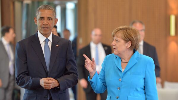 US President Barack Obama and Germany's Chancellor Angela Merkel, arrive for the first working session of a G7 summit at the Elmau Castle near Garmisch-Partenkirchen, southern Germany, on June 7, 2015 - Sputnik International