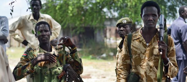 June 24, 2015, South Sudanese government soldiers patrol in Bentiu town, South Sudan. South Sudan’s army has burned people alive, raped and shot girls, and forced tens of thousands from their homes June 24, 2015, South Sudanese government soldiers patrol in Bentiu town, South Sudan. South Sudan’s army has burned people alive, raped and shot girls, and forced tens of thousands from their homes - Sputnik International
