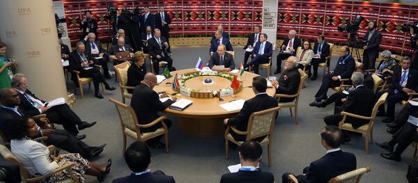 Brazil's President Dilma Rousseff, South Africa's President Jacob Zuma, Russia's President Vladimir Putin, Chinese President Xi Jinping and Indian Prime Minister Narendra Modi sit around the table during a working session at the 7th BRICS summit in Ufa on July 9, 2015 Brazil's President Dilma Rousseff, South Africa's President Jacob Zuma, Russia's President Vladimir Putin, Chinese President Xi Jinping and Indian Prime Minister Narendra Modi sit around the table during a working session at the 7th BRICS summit in Ufa on July 9, 2015 - Sputnik International