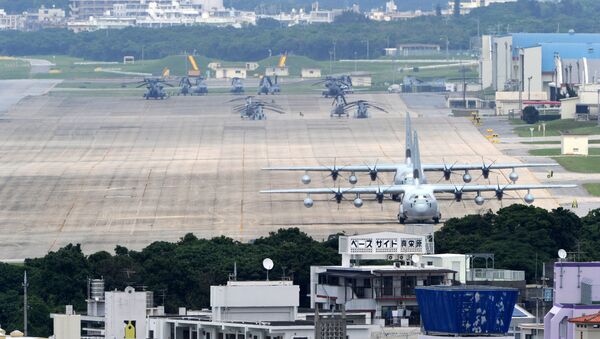 A file picture taken on April 24, 2010 shows planes and helicopters stationed at the US Marine Corps Air Station Futenma base in Ginowan, Okinawa prefecture - Sputnik International