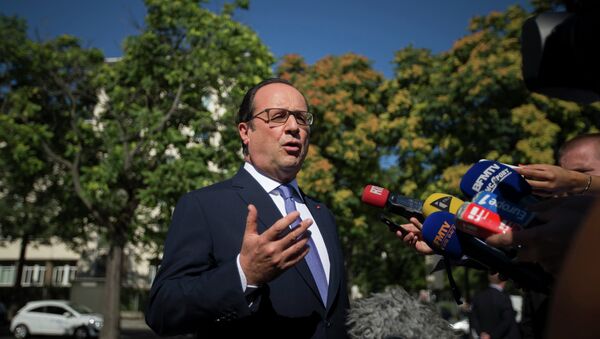 French President Francois Hollande speaks to journalists about Greece after attending the launch of the 'Employment and Insertion' at the headquarters of the French National Olympic and Sports Committee in Paris, France, July 10, 2015 - Sputnik International