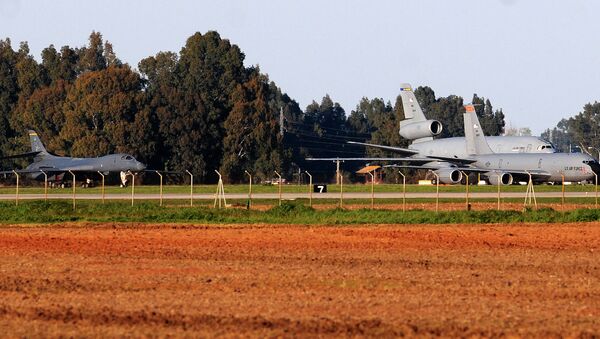 US B1 bomber (L) and tanker aircraft KC135R and KC1O are seen in the air base, in Moron de la Frontera, on March 18, 2011, near Sevilla - Sputnik International