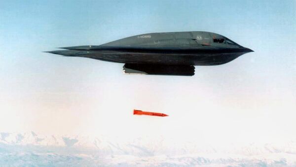 An undated file picture shows a B-2 Spirit Bomber droping a B61-11 bomb casing from an undisclosed location - Sputnik International