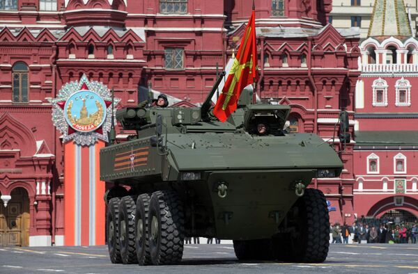 Bumerang armored personnel carrier drives during the Victory Parade marking the 70th anniversary of the defeat of the Nazis in World War II, in Red Square in Moscow, Russia, Saturday, May 9, 2015 Bumerang armored personnel carrier drives during the Victory Parade marking the 70th anniversary of the defeat of the Nazis in World War II, in Red Square in Moscow, Russia, Saturday, May 9, 2015 - Sputnik International