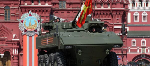 The Bumerang armored personnel carrier drives during the Victory Parade marking the 70th anniversary of the defeat of the Nazis in World War II, in Red Square in Moscow, Russia, Saturday, May 9, 2015 - Sputnik International