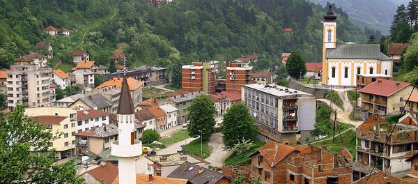This March 2005 file photo shows a general view of the eastern Bosnian town of Srebrenica, with its mosque (L) and Orthodox church (R) - Sputnik International