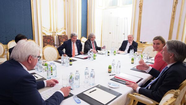 (L-R) German Foreign Minister Frank-Walter Steinmeier, US Secretary of State John Kerry, US Secretary of Energy Ernest Moniz, French Foreign Minister Laurent Fabius, the High Representative of the European Union for Foreign Affairs and Security Policy Federica Mogherini and British Secretary of State for Foreign and Commonwealth Affairs Philip Hammond (C) meet at the Palais Coburg Hotel, where the Iran nuclear talks are being held, in Vienna, Austria on July 14, 2015 - Sputnik International