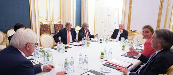 (L-R) German Foreign Minister Frank-Walter Steinmeier, US Secretary of State John Kerry, US Secretary of Energy Ernest Moniz, French Foreign Minister Laurent Fabius, the High Representative of the European Union for Foreign Affairs and Security Policy Federica Mogherini and British Secretary of State for Foreign and Commonwealth Affairs Philip Hammond (C) meet at the Palais Coburg Hotel, where the Iran nuclear talks are being held, in Vienna, Austria on July 14, 2015 - Sputnik International
