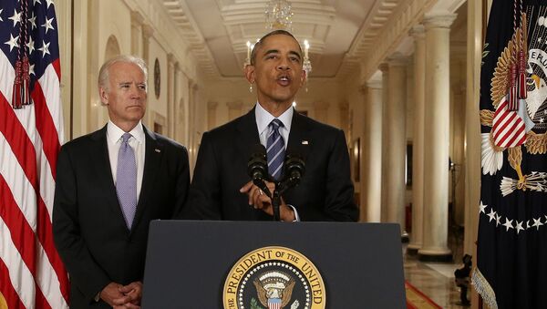U.S. President Barack Obama speaks with Vice President Joe Biden at his side as he delivers a statement about the nuclear deal reached between Iran and six major world powers during an early morning address to the nation from the East Room of the White House in Washington, July 14, 2015 - Sputnik International