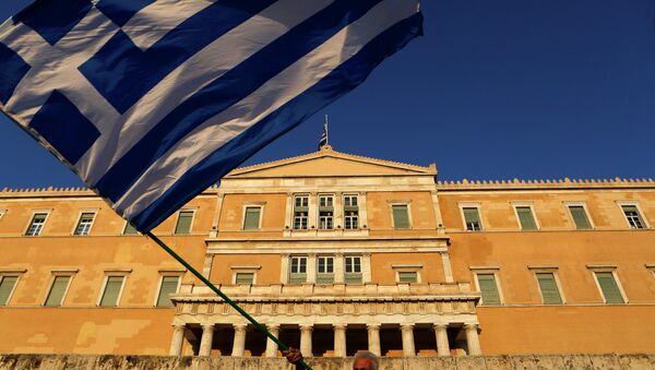 Greek flag in front of the Greek Parliament during a rally at Syntagma square in Athens - Sputnik International
