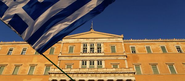 Greek flag in front of the Greek Parliament during a rally at Syntagma square in Athens - Sputnik International