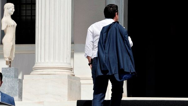 Greek Prime Minister Alexis Tsipras arrives at his office in Athens just after flying in from Brussels on July 13, 2015. - Sputnik International
