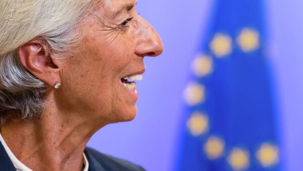 Managing Director of the International Monetary Fund Christine Lagarde smiles as she leaves after a meeting of Eurozone heads of state at the EU Council building in Brussels on Monday, July 13, 2015. - Sputnik International