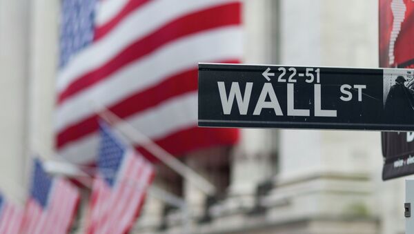 A Wall Street sign hangs near the New York Stock Exchange. - Sputnik International