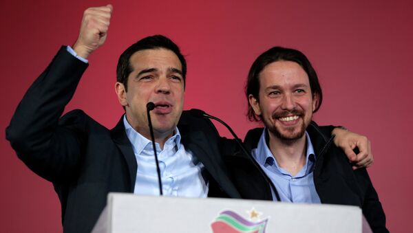 Alexis Tsipras, leader of Greece's Syriza left-wing main opposition party, left, and Pablo Iglesias leader of Spanish Podemos left-wing party wave to the crowd after a pre-election speech at Omonia Square in Athens on Thursday, Jan. 22, 2015. - Sputnik International