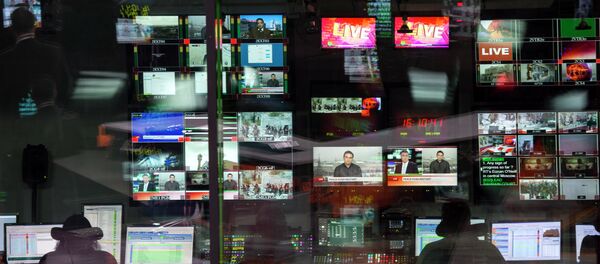 Control room of the Russia Today English-language newsroom - Sputnik International