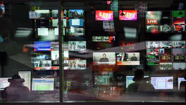 Control room of the Russia Today English-language newsroom. - Sputnik International