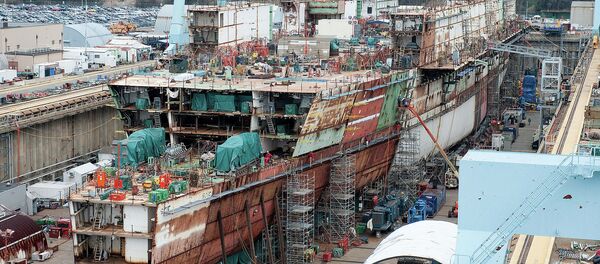 Construction of the USS Ford at the Newport News naval yard in 2012. - Sputnik International