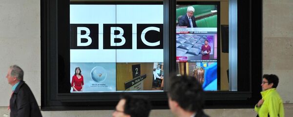 A BBC logo is pictured on a television screen inside the BBC's New Broadcasting House office in central London, on November 12, 2012. - Sputnik International