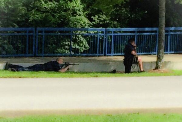 Authorities work an active shooting scene on Amincola Highway near the Naval Reserve Center, in Chattanooga, Tenn. on Thursday, July 16, 2015. - Sputnik International