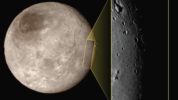 This photo shows Pluto's largest moon Charon, left, with a captivating feature, a depression with a peak in the middle, shown in the upper left corner of the inset image at right. - Sputnik International