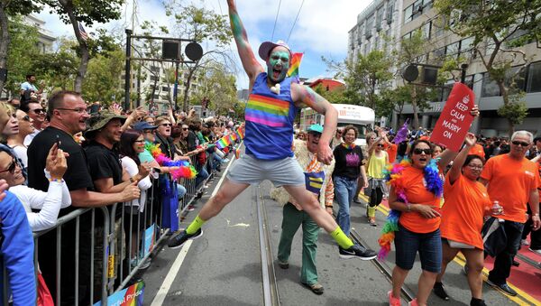 Benj Curtis jumps for joy during the annual Gay Pride Parade in San Francisco, California on June 28, 2015, two days after the US Supreme Court's landmark ruling legalizing same-sex marriage nationwide - Sputnik International