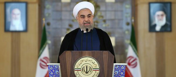 Iran's President Hassan Rouhani addresses the nation in a televised speech after a nuclear agreement was announced in Vienna, in Tehran, Iran, Tuesday, July 14, 2015 Iran's President Hassan Rouhani addresses the nation in a televised speech after a nuclear agreement was announced in Vienna, in Tehran, Iran, Tuesday, July 14, 2015 - Sputnik International