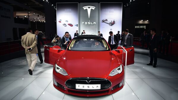 A Tesla Model S P85d car is displayed at the 16th Shanghai International Automobile Industry Exhibition in Shanghai on April 20, 2015 - Sputnik International