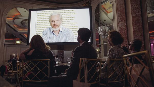 Julian Assange speaks remotely via a live feed at The 24th Annual PEN Center USA Literary Awards Festival at The Beverly Wilshire Hotel on Tuesday, Nov. 11, 2014, in Beverly Hills, Calif. - Sputnik International