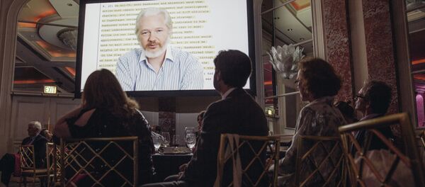 Julian Assange speaks remotely via a live feed at The 24th Annual PEN Center USA Literary Awards Festival at The Beverly Wilshire Hotel on Tuesday, Nov. 11, 2014, in Beverly Hills, Calif. - Sputnik International