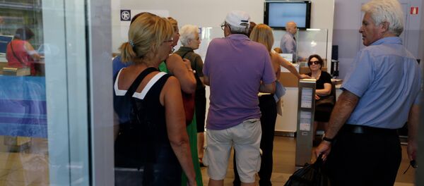 Customers wait to be served inside an Alpha Bank branch in Athens, Monday, July 20, 2015 Customers wait to be served inside an Alpha Bank branch in Athens, Monday, July 20, 2015 - Sputnik International