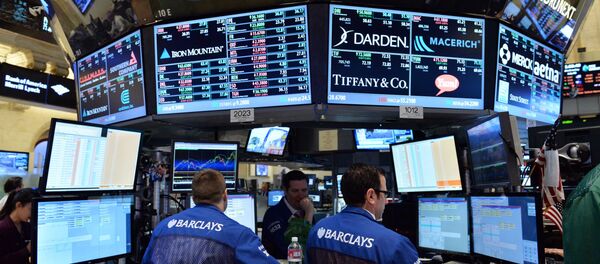 Stock specialists at the Barclays post work on the floor of the New York Stock Exchange just after the closing bell on July 3, 2013 in New York Stock specialists at the Barclays post work on the floor of the New York Stock Exchange just after the closing bell on July 3, 2013 in New York - Sputnik International