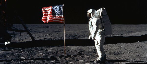 Astronaut Edwin E. Buzz Aldrin, Jr., lunar module pilot of the first lunar landing mission, poses during Extravehicular Activity (EVA) on the lunar surface. Taken by fellow astronaut Neil A. Armstrong with a 70 mm Hasselblad lunar surface camera in an area called the Sea of Tranquility, this 20 July, 1969 file photo shows the Lunar Module (LM) on the left, with the footprints of the astronauts clearly visible in the foreground. While astronauts Armstrong and Aldrin descended in the LM known as the Eagle, astronaut Michael Collins, command module pilot, remained with the Command and Service Modules (CSM) Columbia in lunar-orbit. - Sputnik International