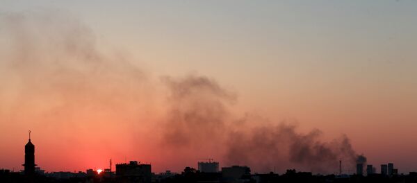 Black smoke billows in the sky amid clashes between rival Libyan factions in Benghazi. Black smoke billows in the sky amid clashes between rival Libyan factions in Benghazi. - Sputnik International