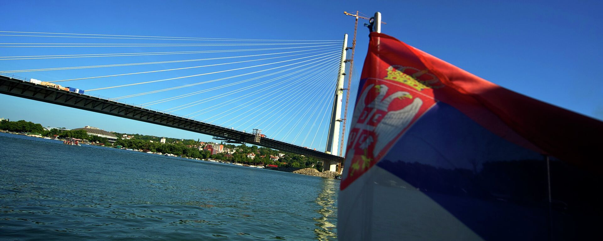 View of the new Sava River Bridge in Belgrade near the Ada Ciganlija river island connecting on August 8, 2011, the river banks of Belgrade and New Belgrade - Sputnik International, 1920, 30.12.2023
