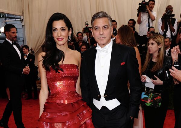 Amal and George Clooney arrive at The Metropolitan Museum of Art's Costume Institute benefit gala. Amal and George Clooney arrive at The Metropolitan Museum of Art's Costume Institute benefit gala. - Sputnik International