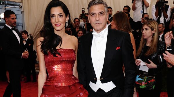 Amal and George Clooney arrive at The Metropolitan Museum of Art's Costume Institute benefit gala. - Sputnik International