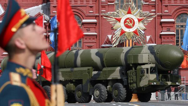 File Photo: A Russian Topol-M ICBM drives across Red Square in a Victory Day Parade in Moscow on May 9, 2008 - Sputnik International