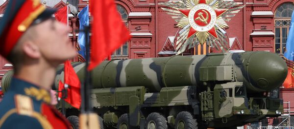 File Photo: A Russian Topol-M ICBM drives across Red Square in a Victory Day Parade in Moscow on May 9, 2008 - Sputnik International