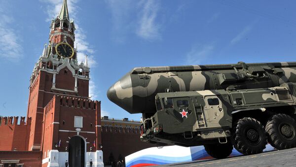 Russian Topol-M intercontinental ballistic missiles drive through Red Square during the Victory Day parade in Moscow on May 9, 2010 - Sputnik International