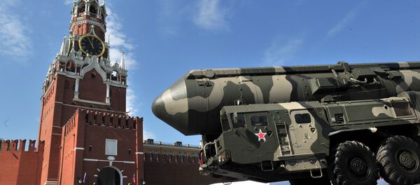 Russian Topol-M intercontinental ballistic missiles drive through Red Square during the Victory Day parade in Moscow on May 9, 2010 - Sputnik International
