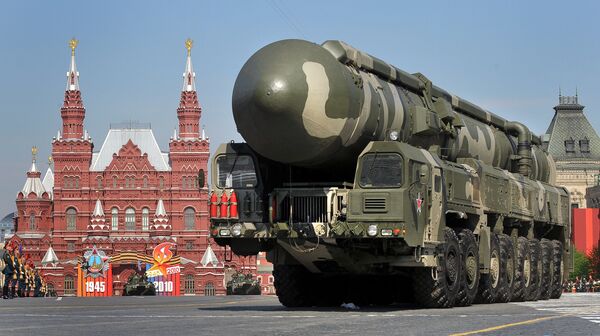 Russian Topol-M intercontinental ballistic misiles drive through Red Square during the Victory Day parade in Moscow. File photo Russian Topol-M intercontinental ballistic misiles drive through Red Square during the Victory Day parade in Moscow. File photo - Sputnik International